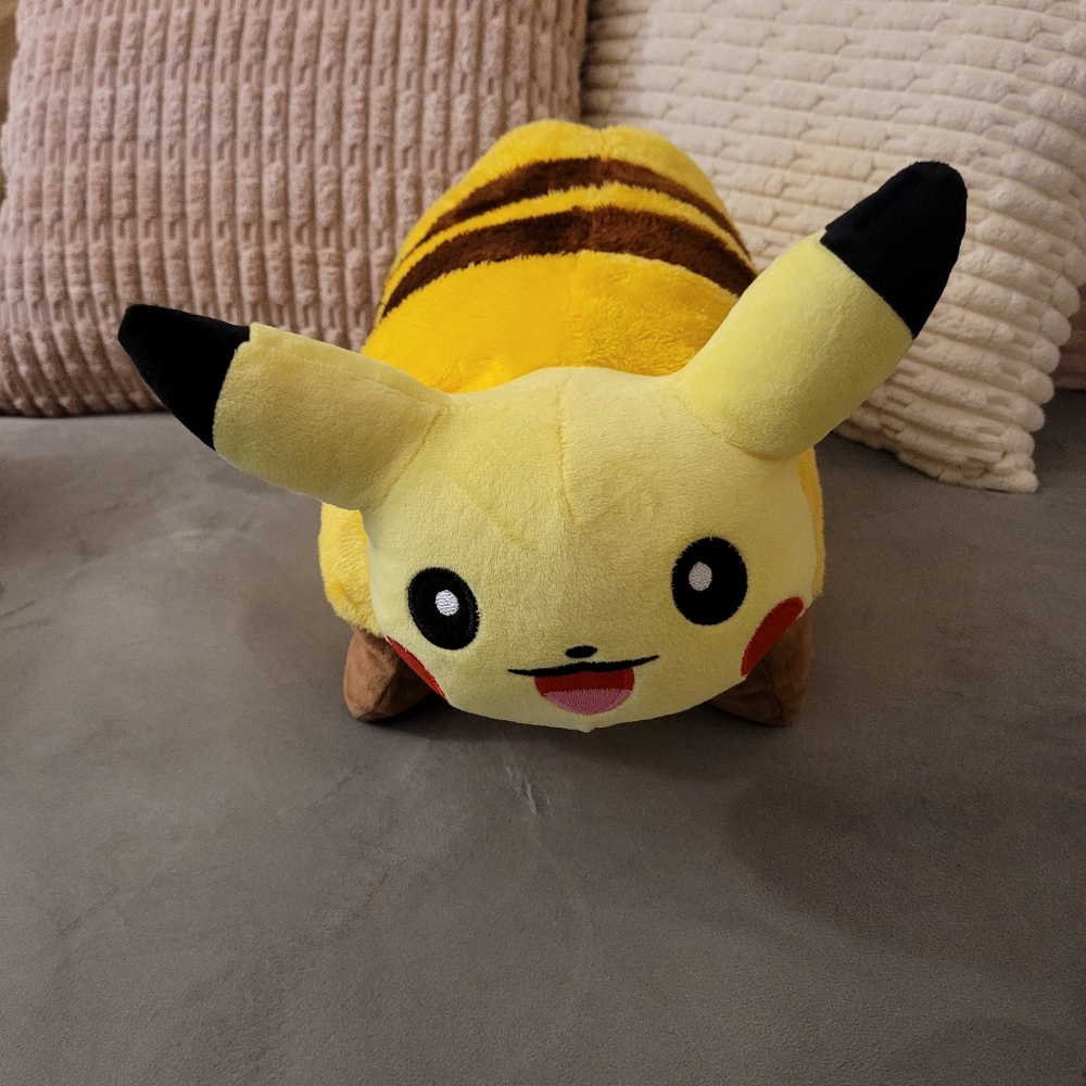Pikachu pillow 18"x 18"approximately.